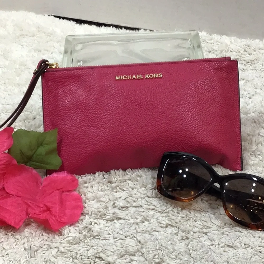 Michael Kors pink leather zip top wristlet